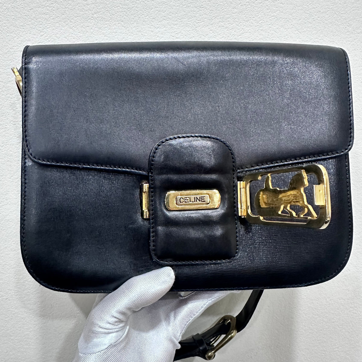 CELINE  Vintage Celine Horse Carriage Buckle Shoulder Bag in Dark leather with a Signature Gold-and-Silver Tone Sulky Horse-and-Carriage Front Clasp
