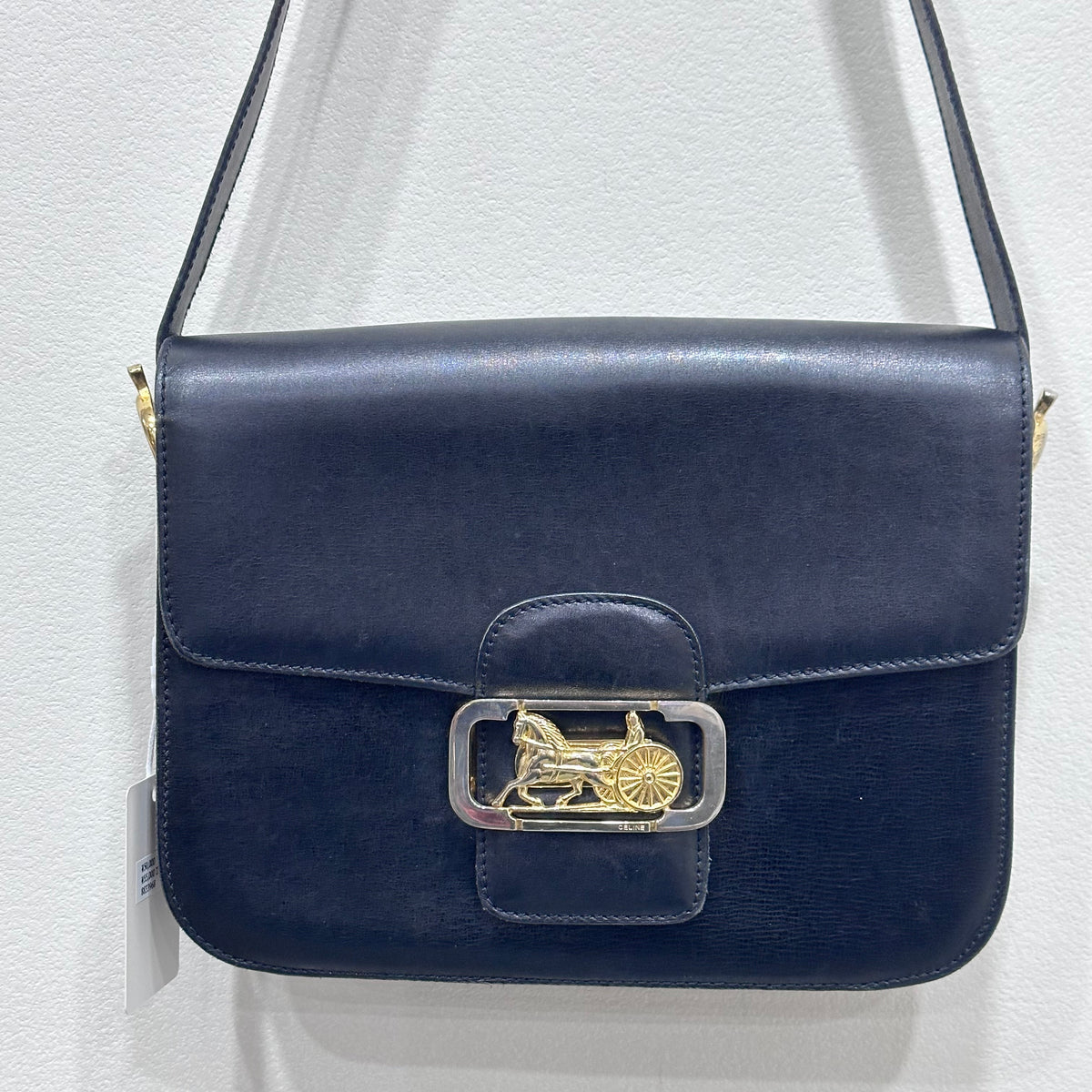 CELINE  Vintage Celine Horse Carriage Buckle Shoulder Bag in Dark leather with a Signature Gold-and-Silver Tone Sulky Horse-and-Carriage Front Clasp