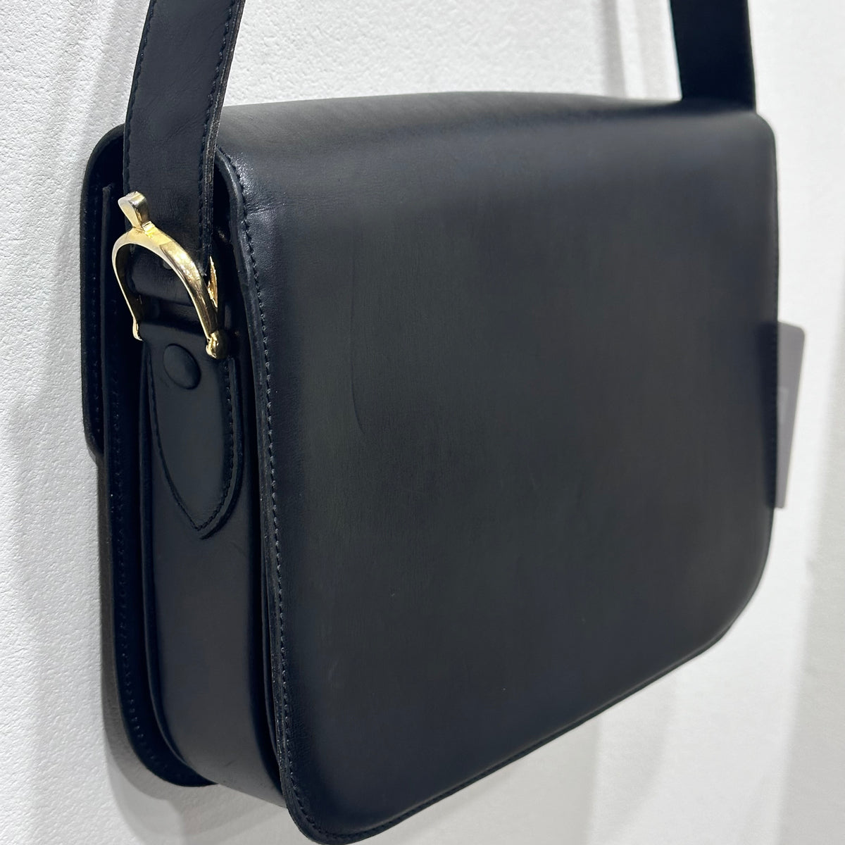 CELINE  Vintage Celine Horse Carriage Buckle Shoulder Bag in Dark leather with a Signature Gold-and-Silver Tone Sulky Horse-and-Carriage Front Clasp