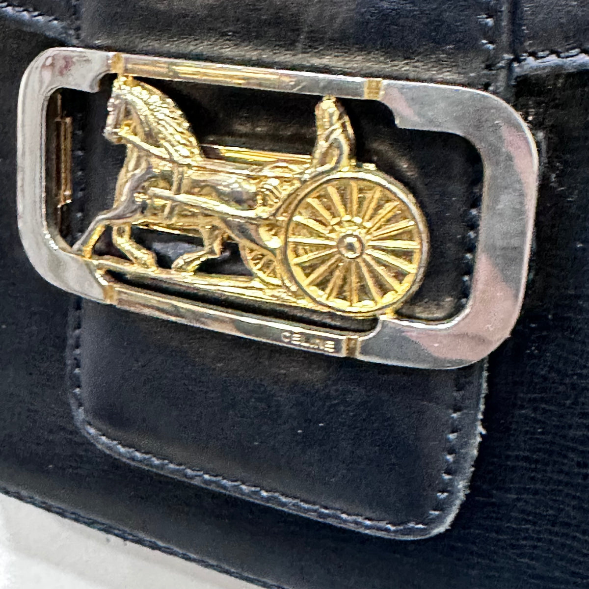 CELINE  Vintage Celine Horse Carriage Buckle Shoulder Bag in Dark leather with a Signature Gold-and-Silver Tone Sulky Horse-and-Carriage Front Clasp