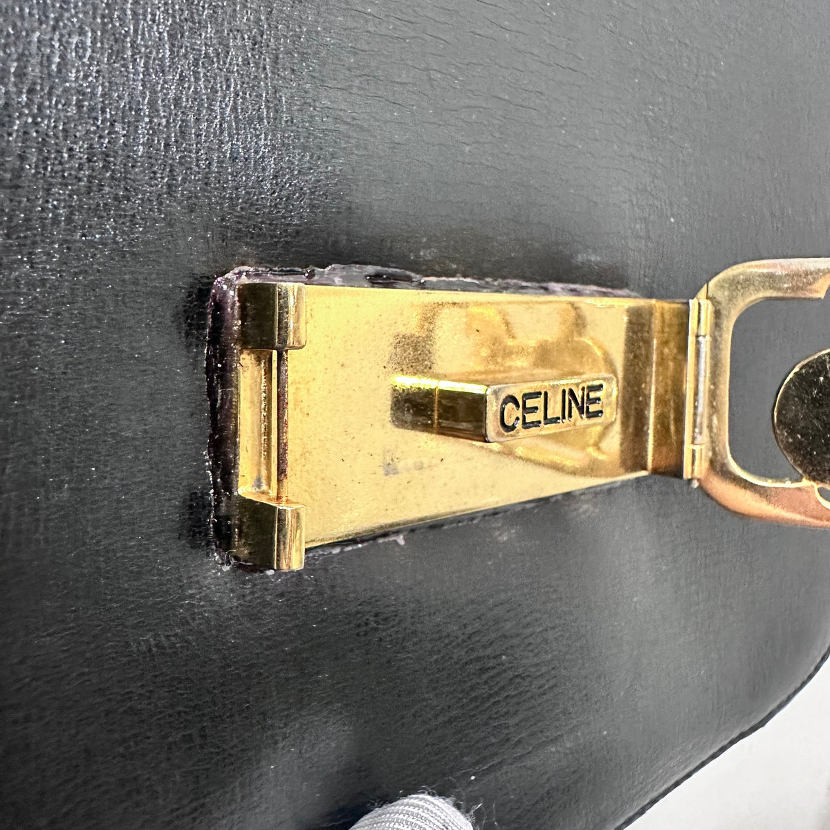 CELINE  Vintage Celine Horse Carriage Buckle Shoulder Bag in Dark leather with a Signature Gold-and-Silver Tone Sulky Horse-and-Carriage Front Clasp
