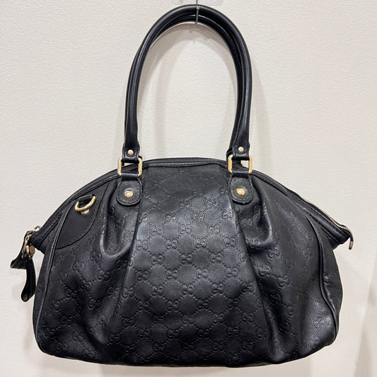 GUCCI Sukey Handbag in Timeless Black Guccissima (GG embossed) Leather