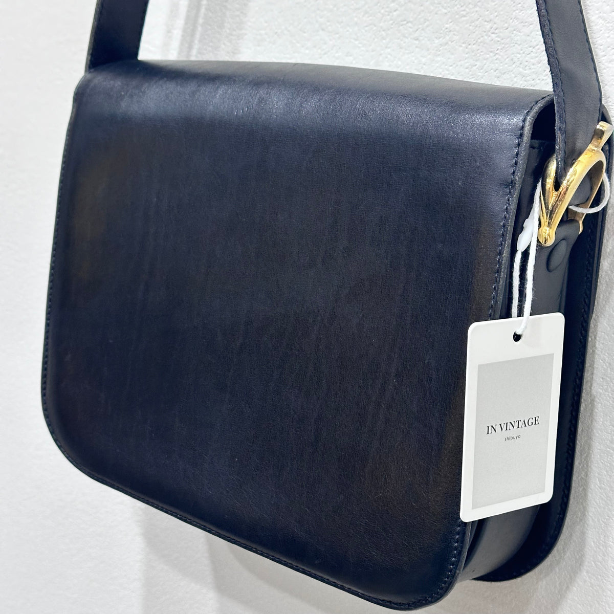CELINE  Vintage Celine Horse Carriage Buckle Shoulder Bag in Dark leather with a Signature Gold-and-Silver Tone Sulky Horse-and-Carriage Front Clasp