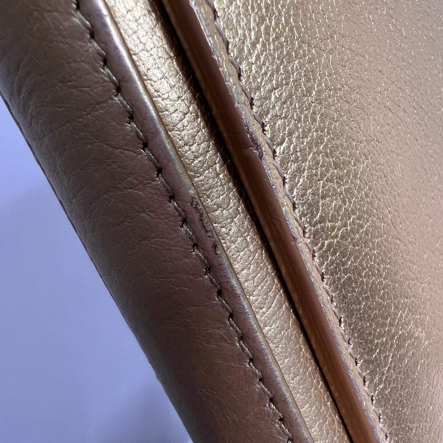 YSL Metallic Gold Leather