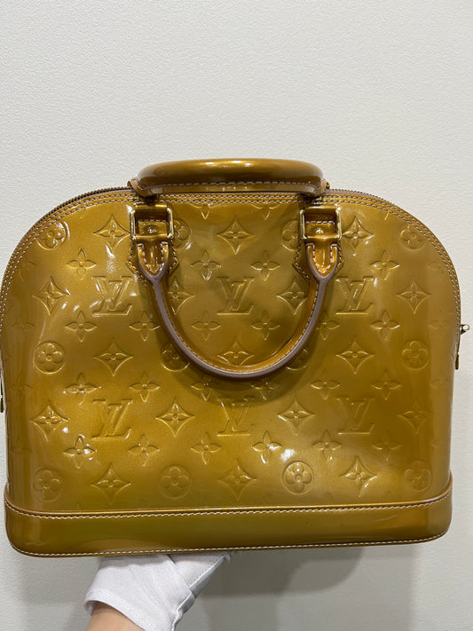 LOUIS VUITTON Gold Handbag